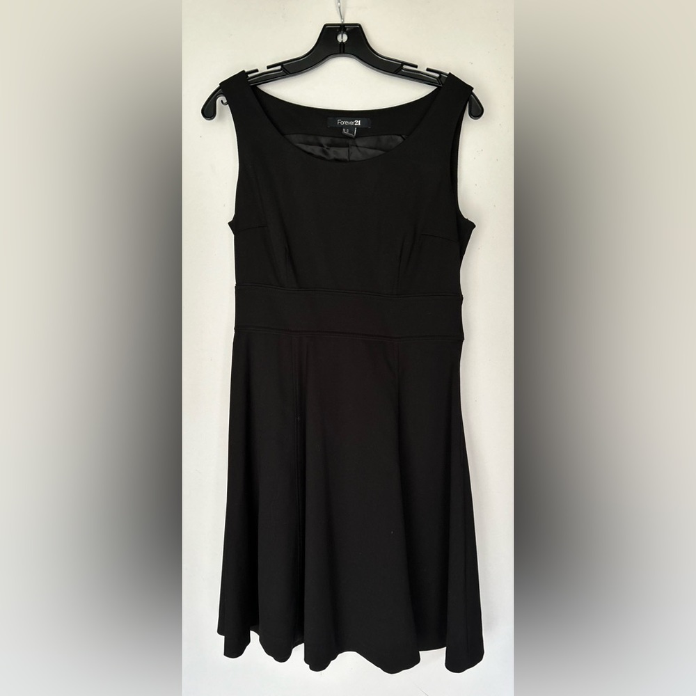 Forever 21 black sleeveless lined dress size 10, length  37 inches long.